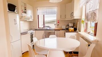 Full-size fridge, microwave, oven, espresso maker