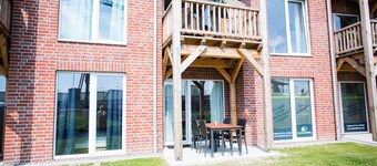 Modern, bright apartment with terrace, directly behind the dike, in the North Sea resort Wremen