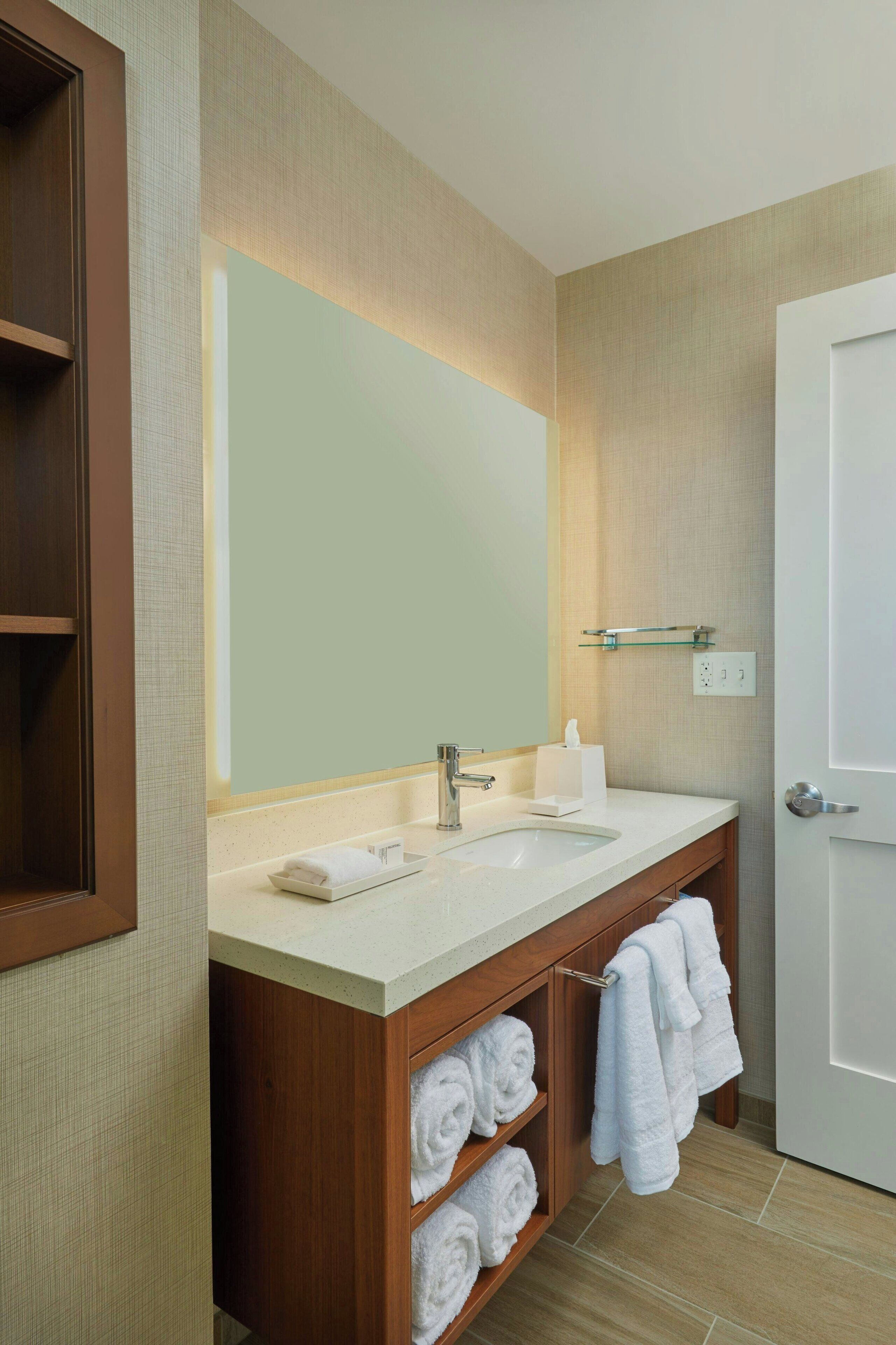 hair dryer, towels, soap, shampoo