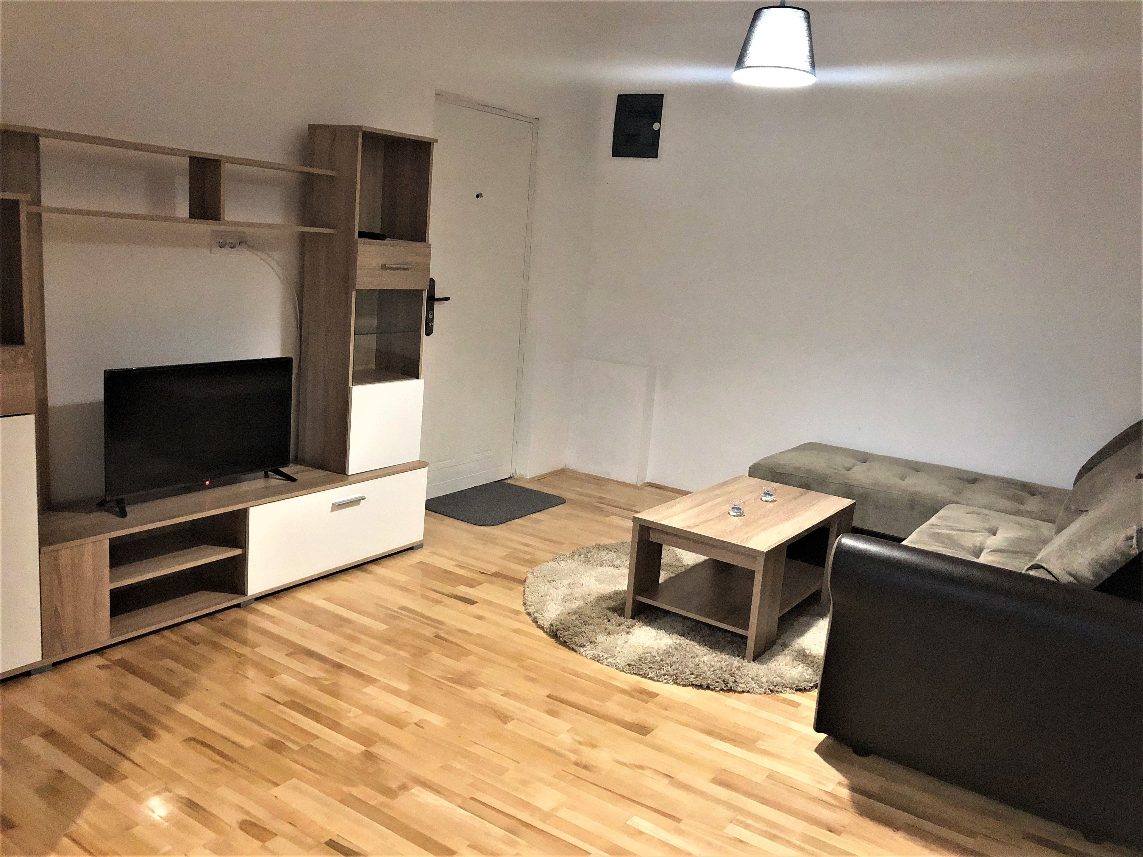 deluxe quadruple room | living area | led tv, netflix