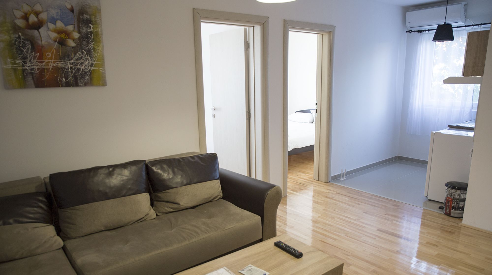 deluxe quadruple room | living area | led tv, netflix