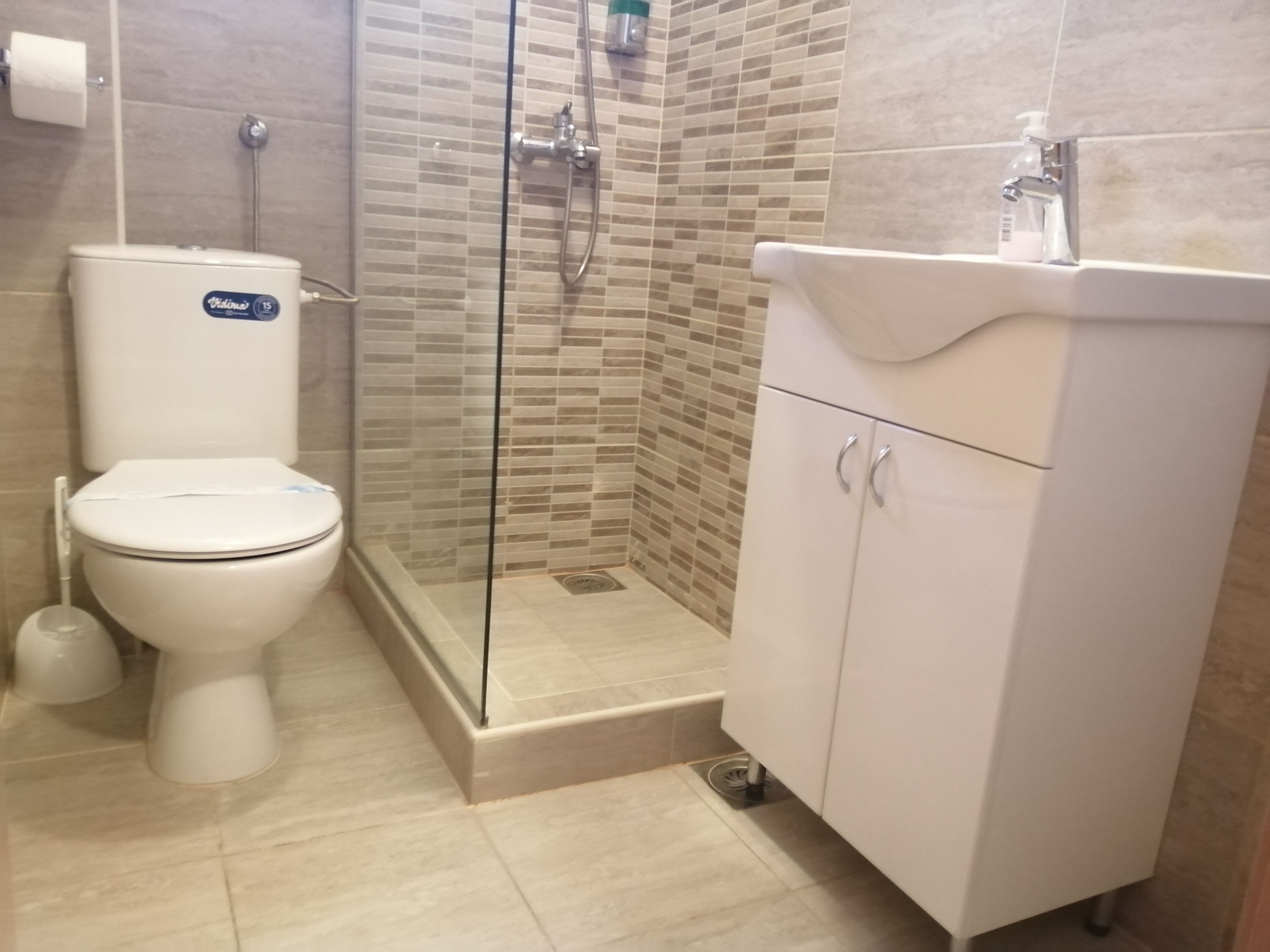 deluxe studio | bathroom | shower, free toiletries, hair dryer, dressing gowns