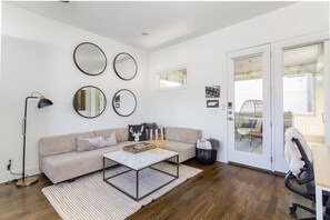 Smart TV, fireplace, books, printers