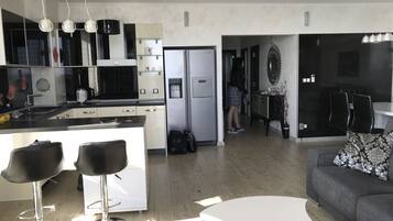 Luxury Apartment, 2 Bedrooms, Balcony, Sea View | Living area | Flat-screen TV, video-game console