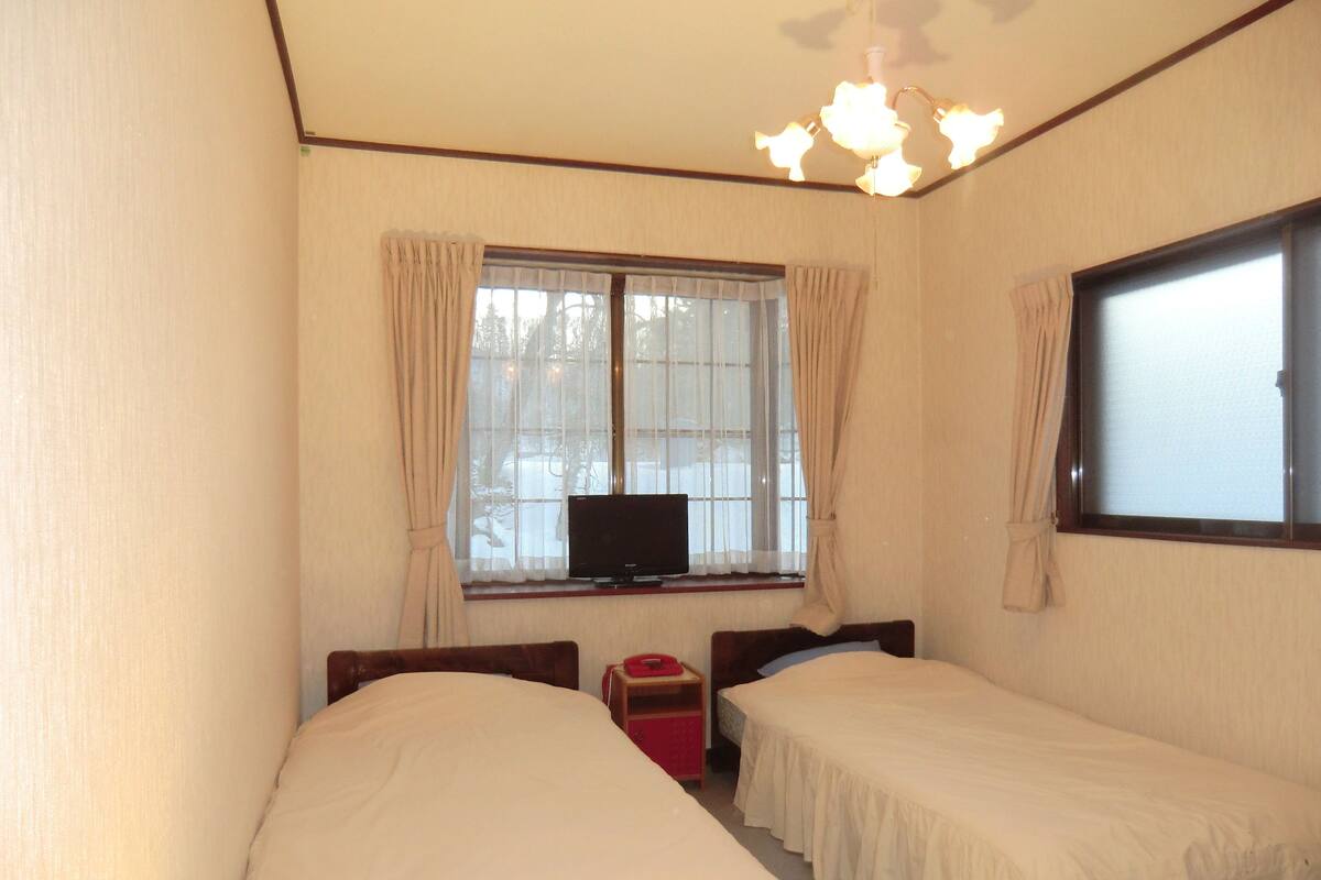 Habitación con 2 camas individuales