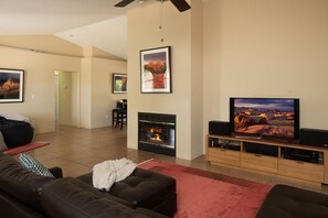 Smart TV, fireplace, DVD player, books