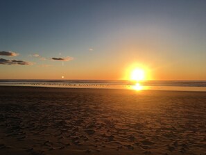 On the beach, sun-loungers, beach towels