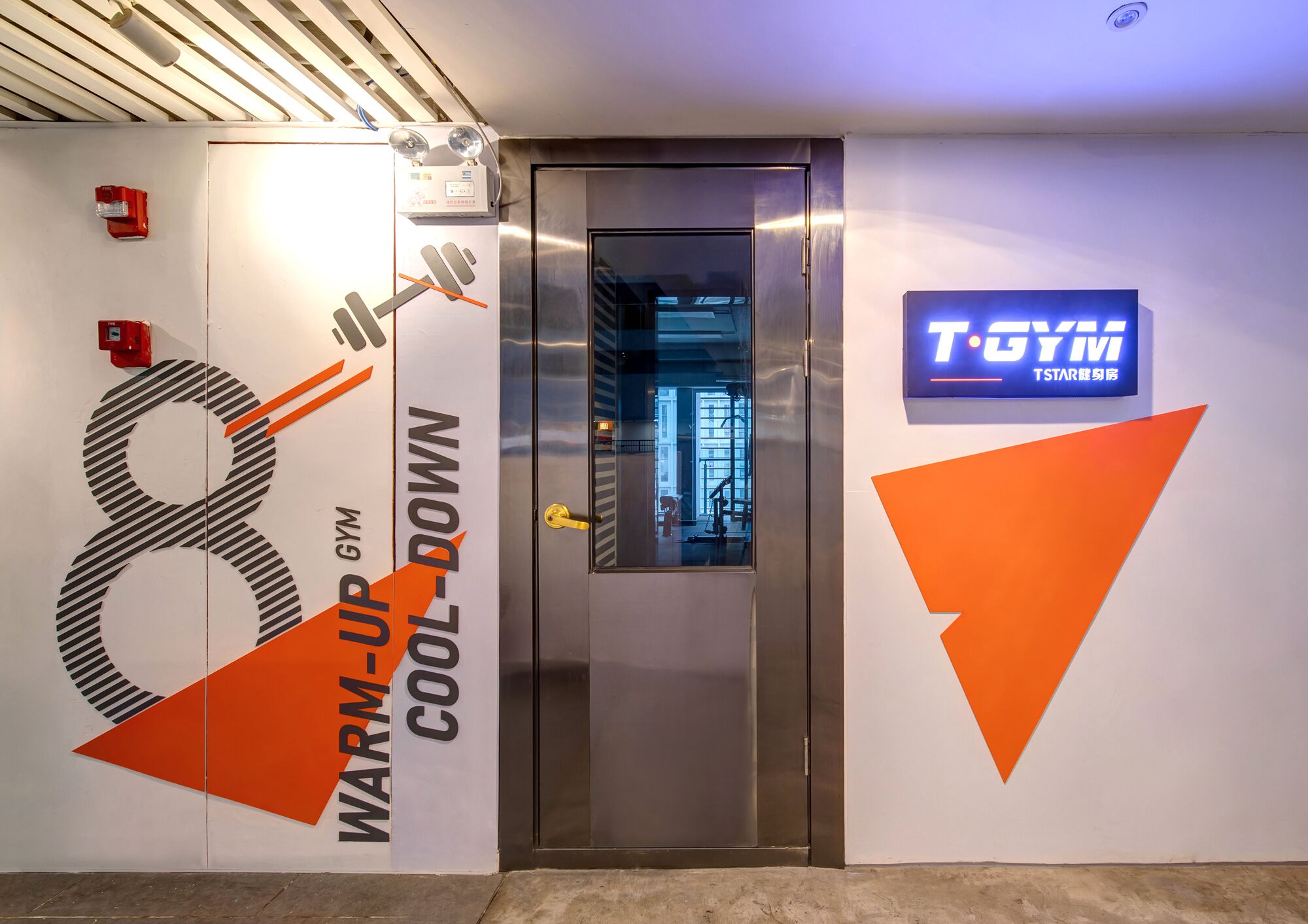 A gym entrance with a large number '8' and text 'WARM-UP GYM COOL-DOWN'.
