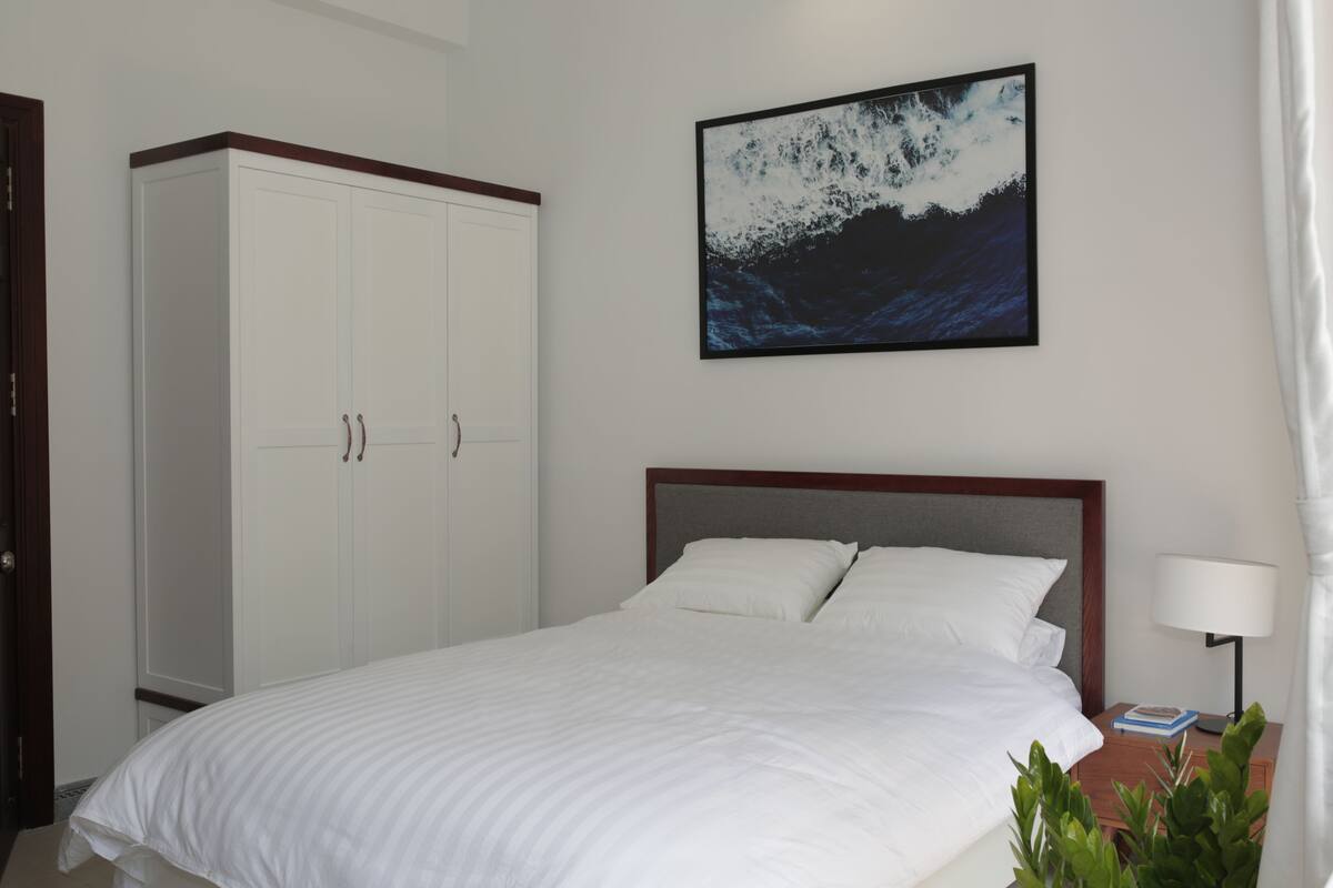 Minibar, desk, blackout curtains, iron/ironing board