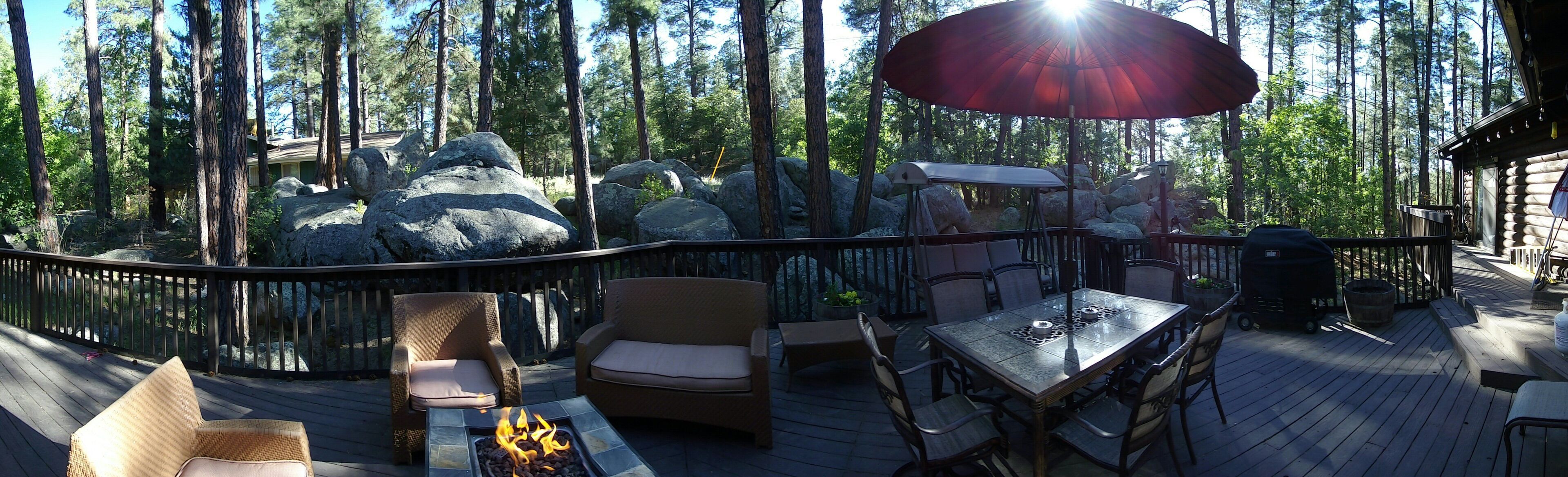 Charming log cabin in the woods. Now with EV charging.