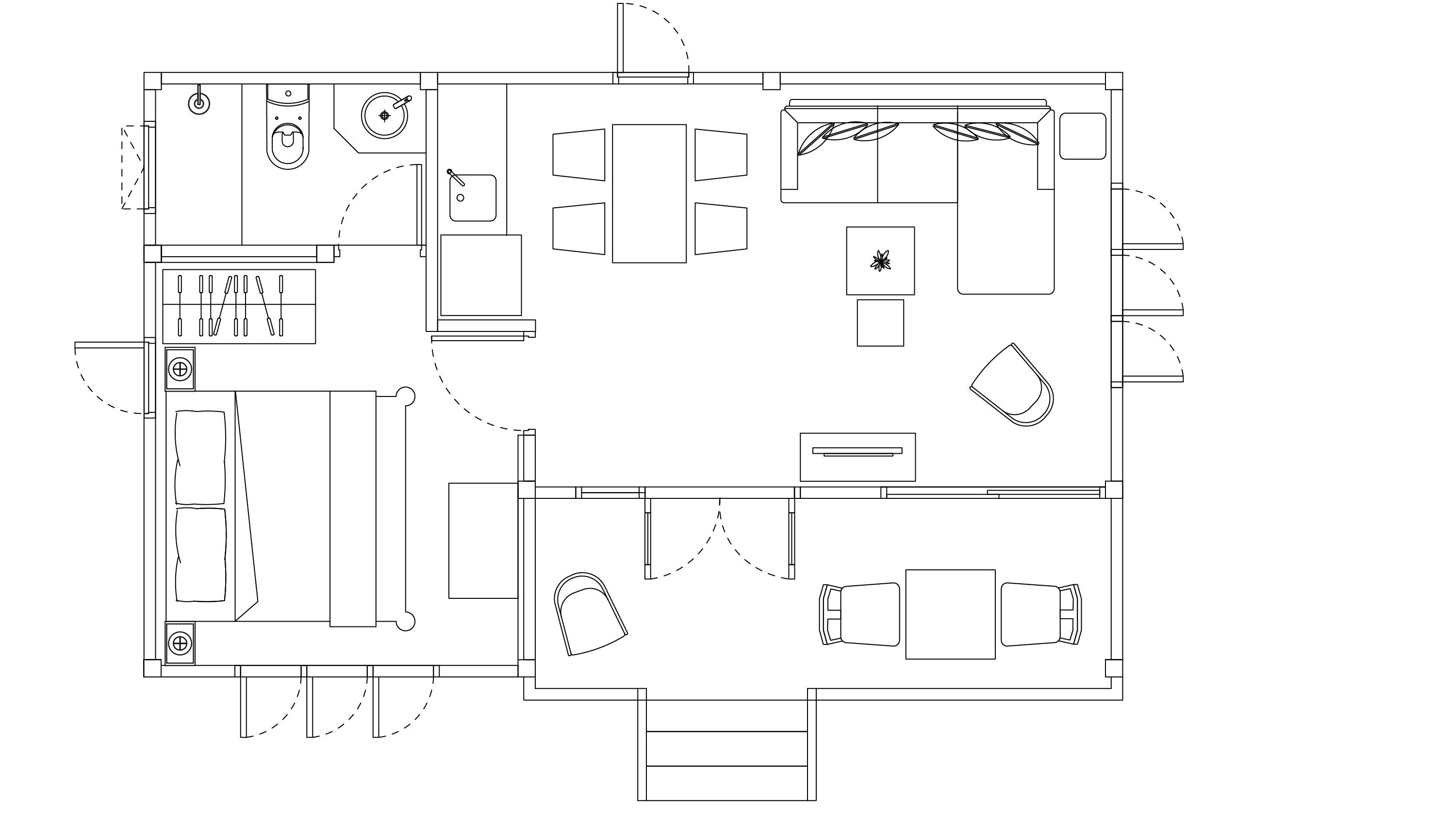 Plano de planta de un hotel que muestra una cocina, comedor y una pequeña zona de estar.