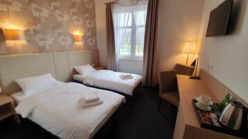 Desk, free WiFi, bed sheets