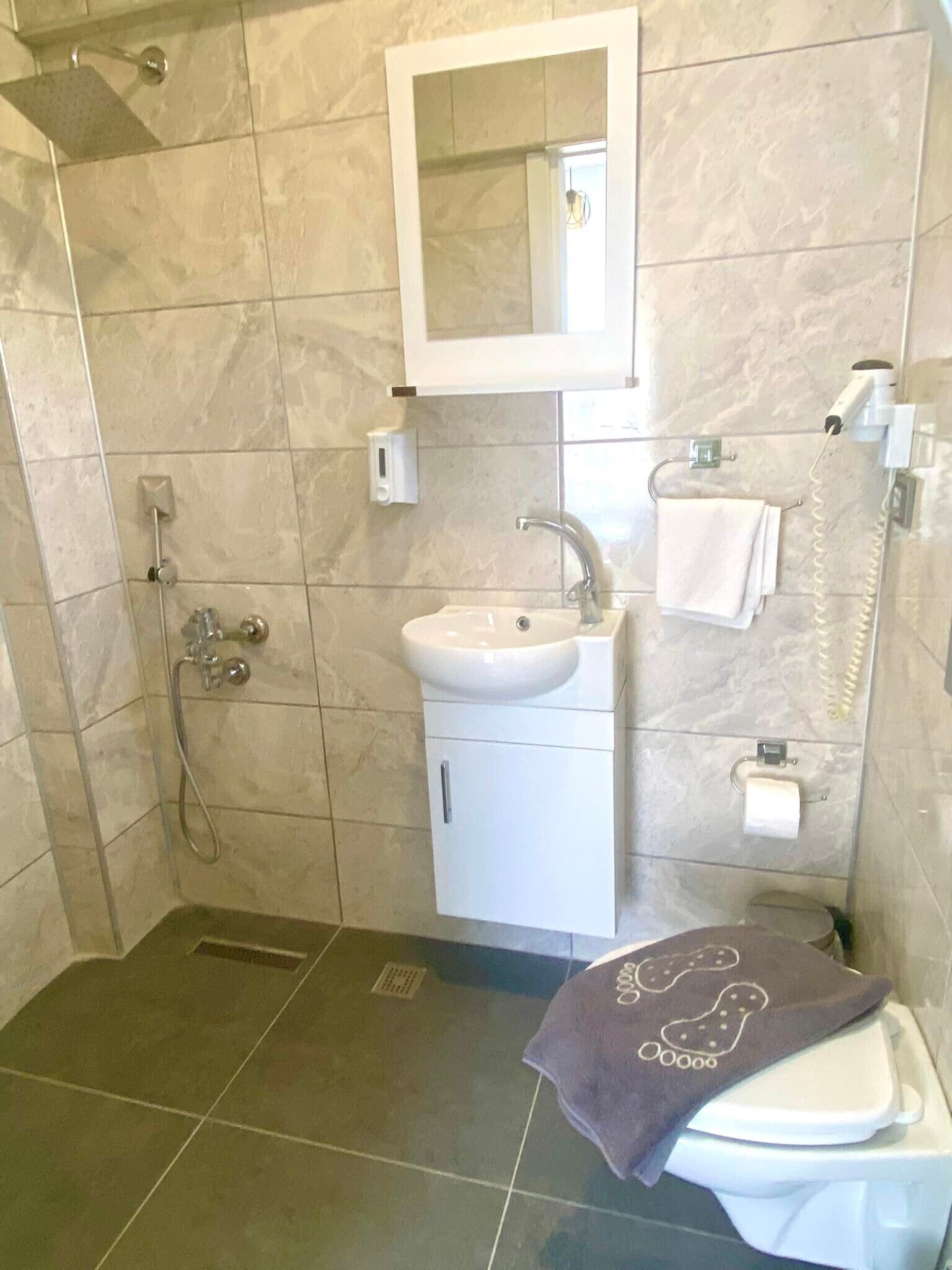 double or twin room | bathroom | shower, hair dryer, towels