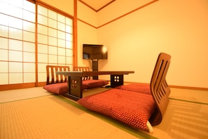 Chambre Double Standard | Coin séjour | Télévision à écran plat