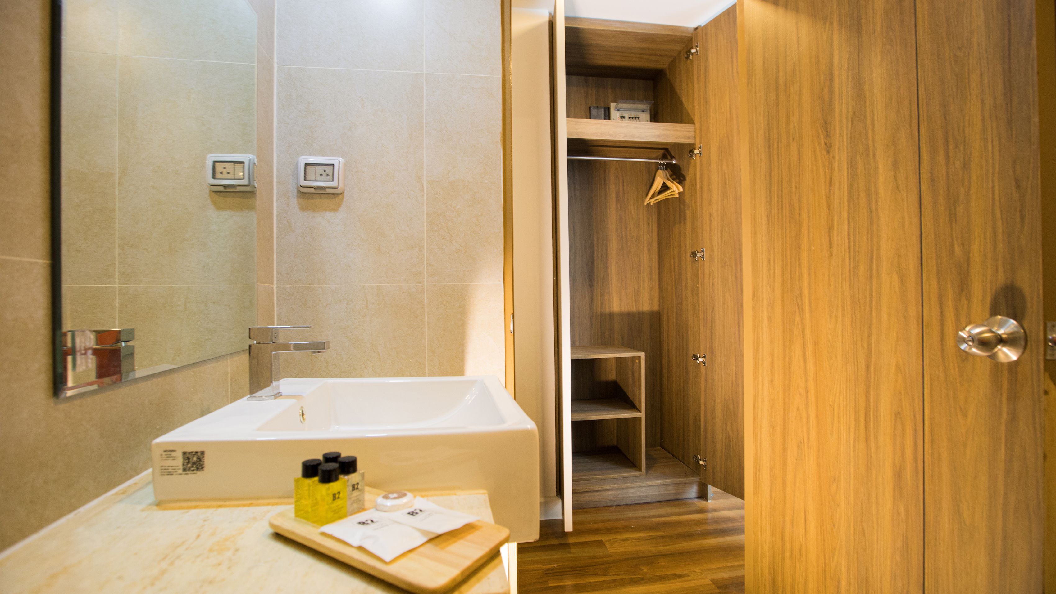 deluxe triple room | bathroom | shower, free toiletries, hair dryer, towels