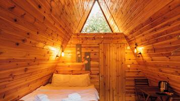 Klassiek huisje | Een minibar, individueel gedecoreerd, individueel gemeubileerd