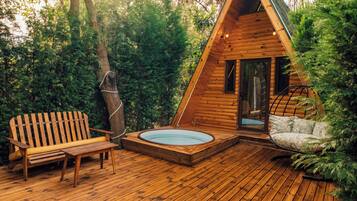 Klassiek huisje | Een minibar, individueel gedecoreerd, individueel gemeubileerd