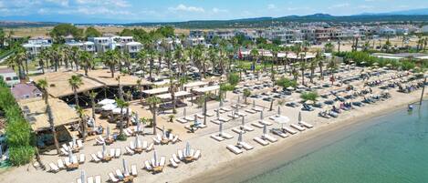 Private beach, sun loungers, beach umbrellas, beach volleyball