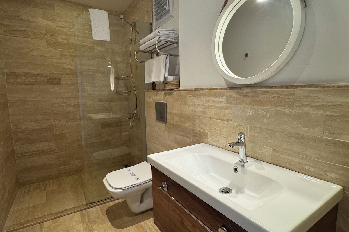 family room | premium bedding, minibar, in-room safe, blackout curtains