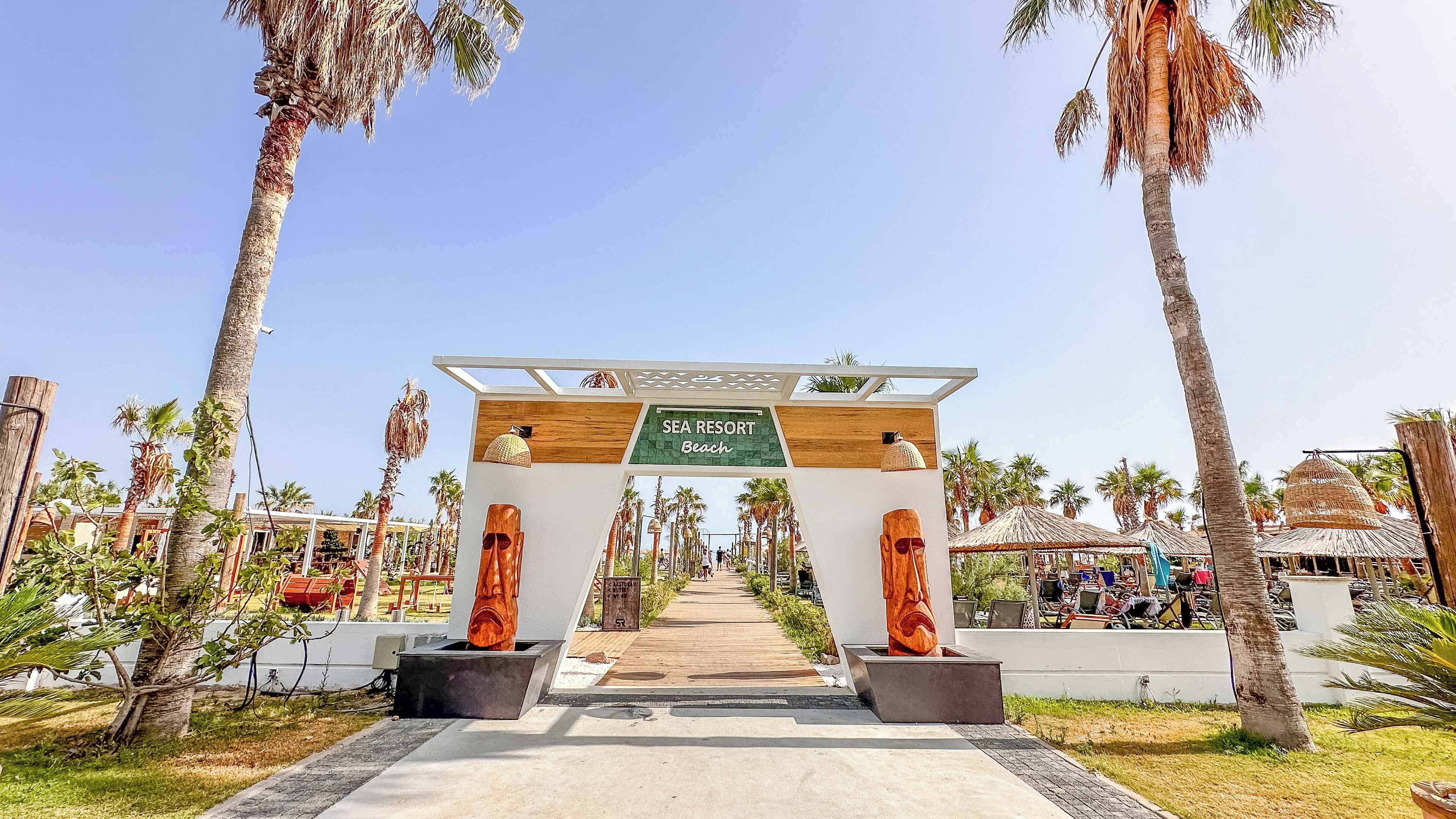 private beach, sun-loungers, beach umbrellas, beach volleyball