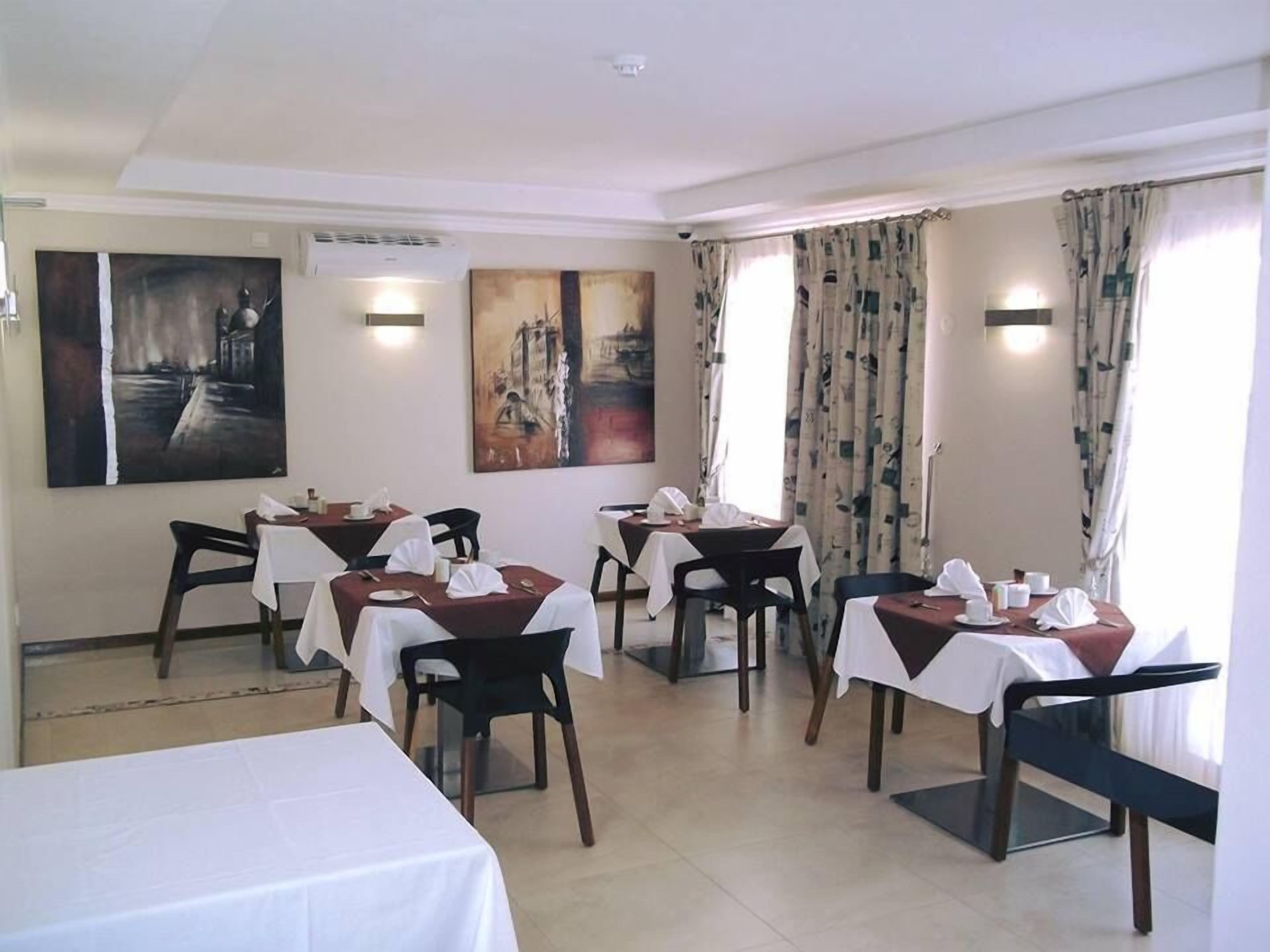 Breakfast, lunch, dinner served; local and international cuisine 