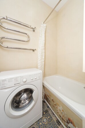 Apartment | Bathroom | Combined shower/tub, towels, soap, toilet paper