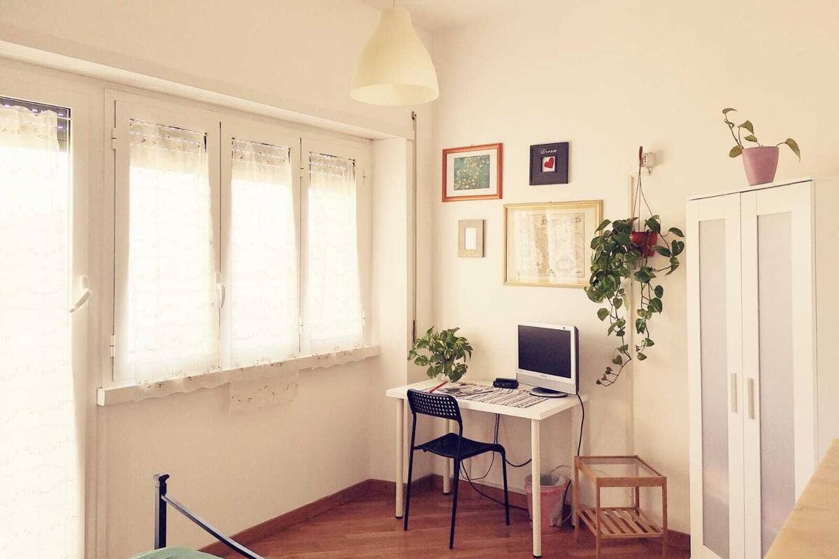 Desk, laptop workspace, blackout curtains