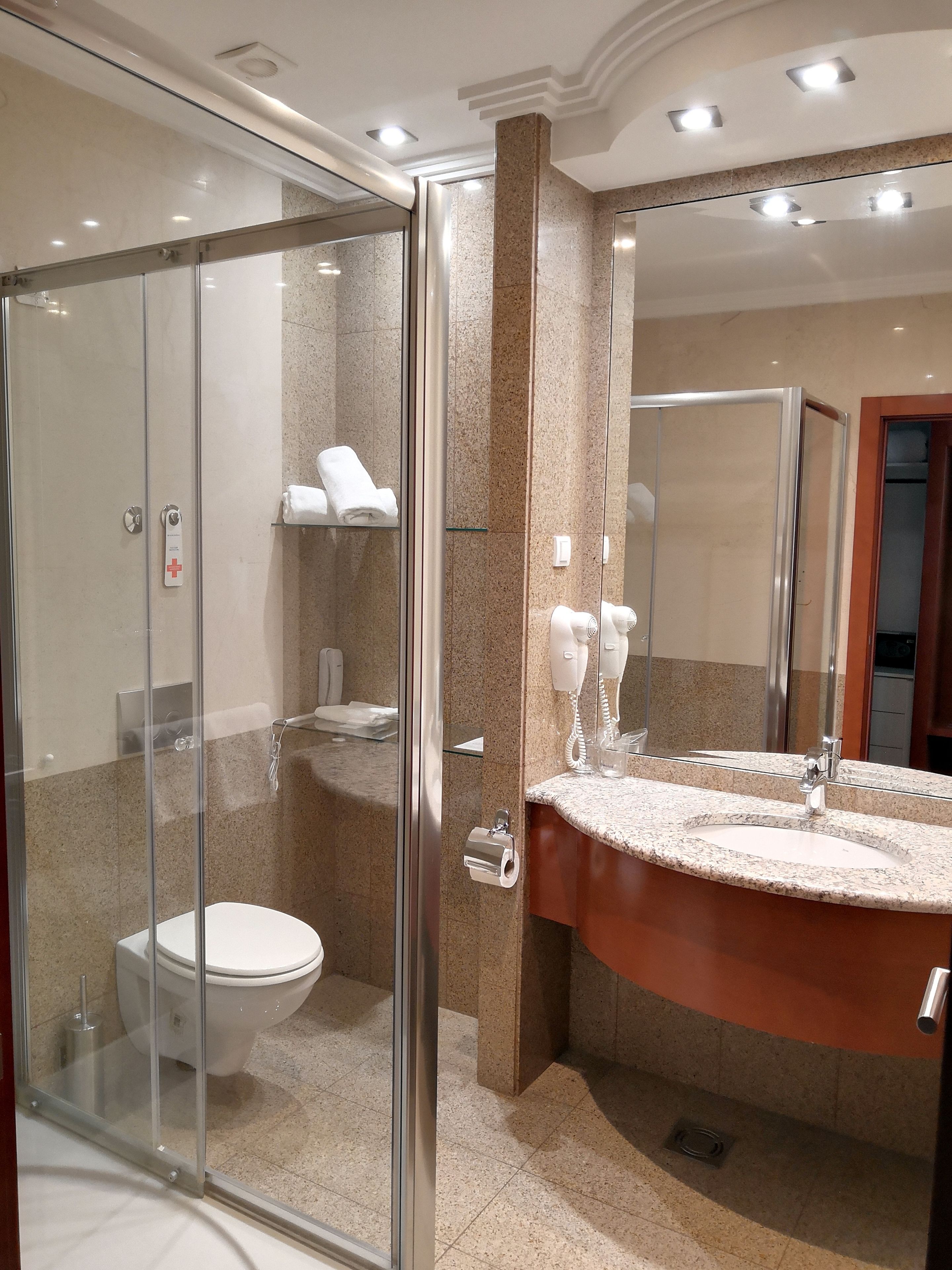 shower, free toiletries, hair dryer, towels