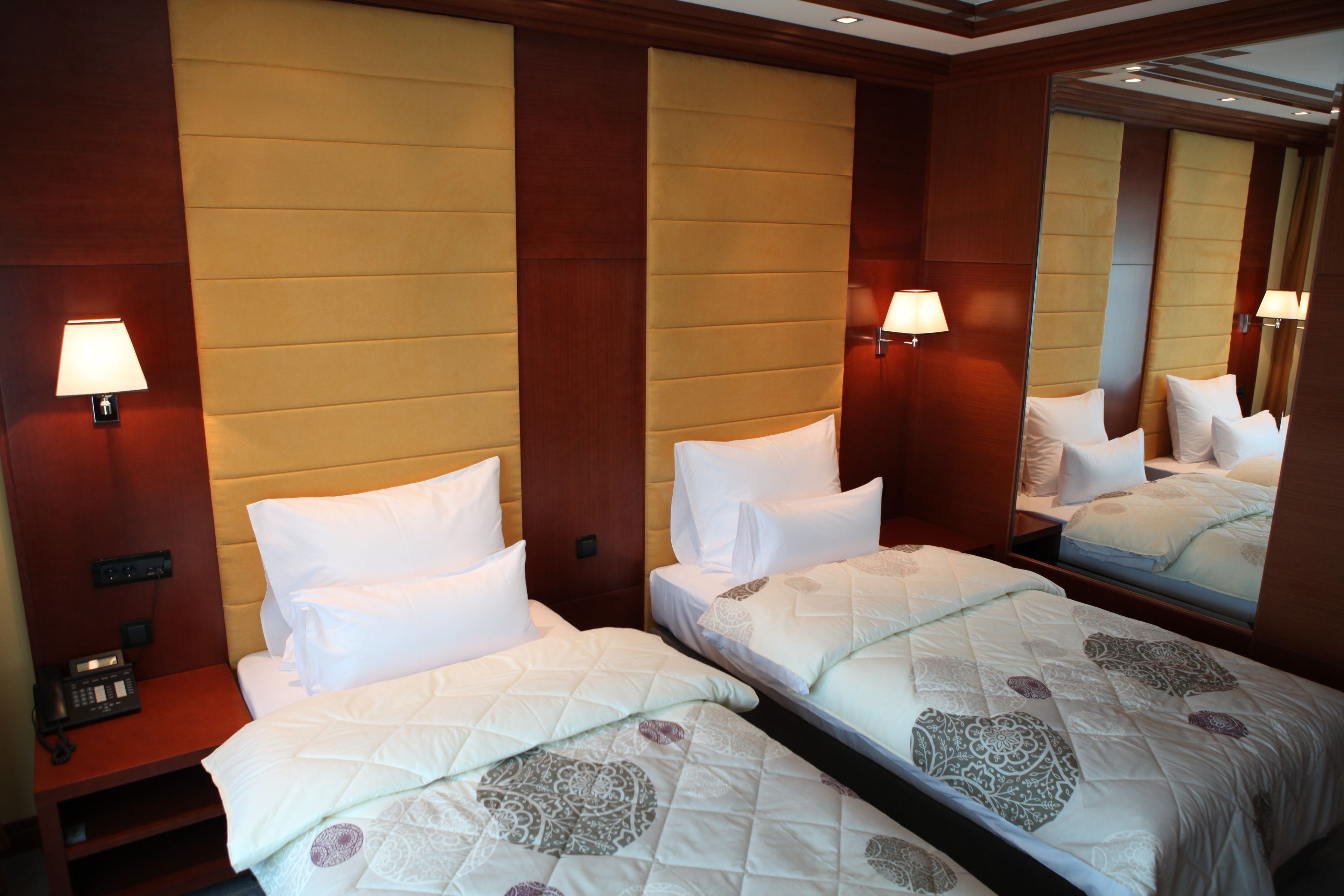 twin room | minibar, in-room safe, desk, laptop workspace