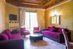 Comfort Apartment, 2 Bedrooms | Living area | Flat-screen TV