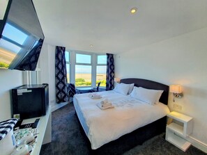 Deluxe-Doppelzimmer, 1 King-Bett, Meerblick | Bügeleisen/Bügelbrett, kostenloses WLAN, Bettwäsche