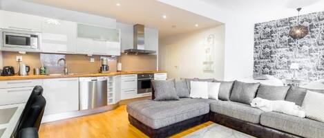 Family Apartment, 2 Bedrooms, Sauna, Courtyard View | Living area | Flat-screen TV, Netflix, streaming services