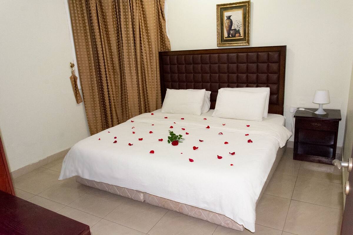 Blackout drapes, iron/ironing board, WiFi (free), bed sheets