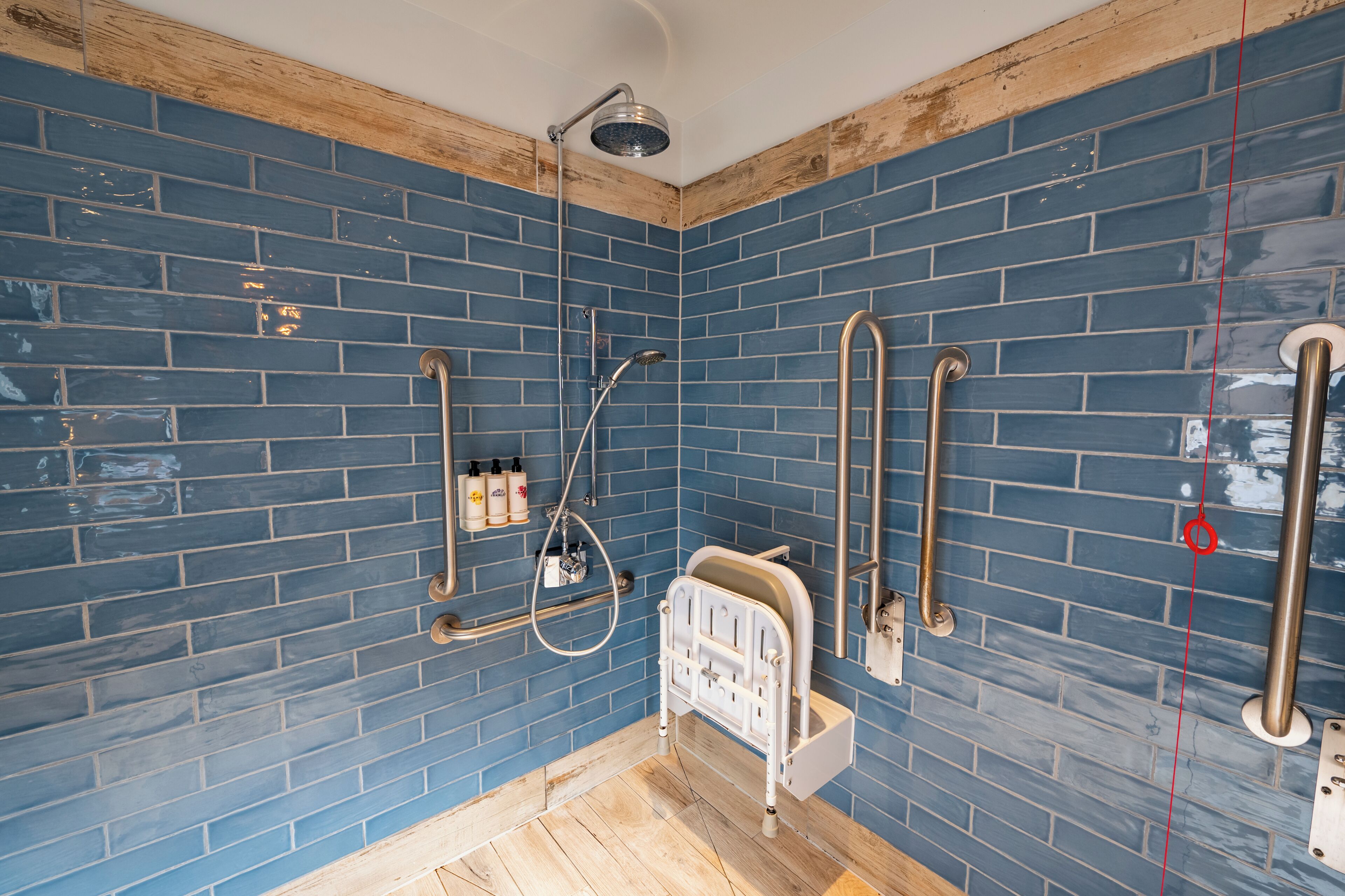 deluxe double room | bathroom | shower, rainfall showerhead, designer toiletries, hair dryer