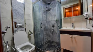 Shower, free toiletries, hair dryer, slippers