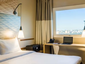 Minibar, desk, blackout drapes, soundproofing