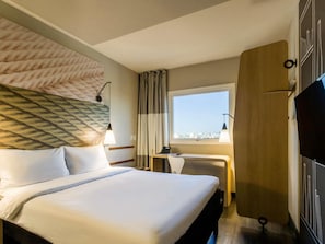 Minibar, desk, blackout drapes, soundproofing