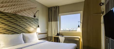 Minibar, desk, blackout drapes, soundproofing