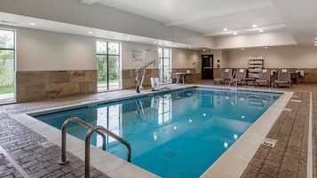 Indoor pool, open 7:00 AM to 10:00 PM, pool loungers