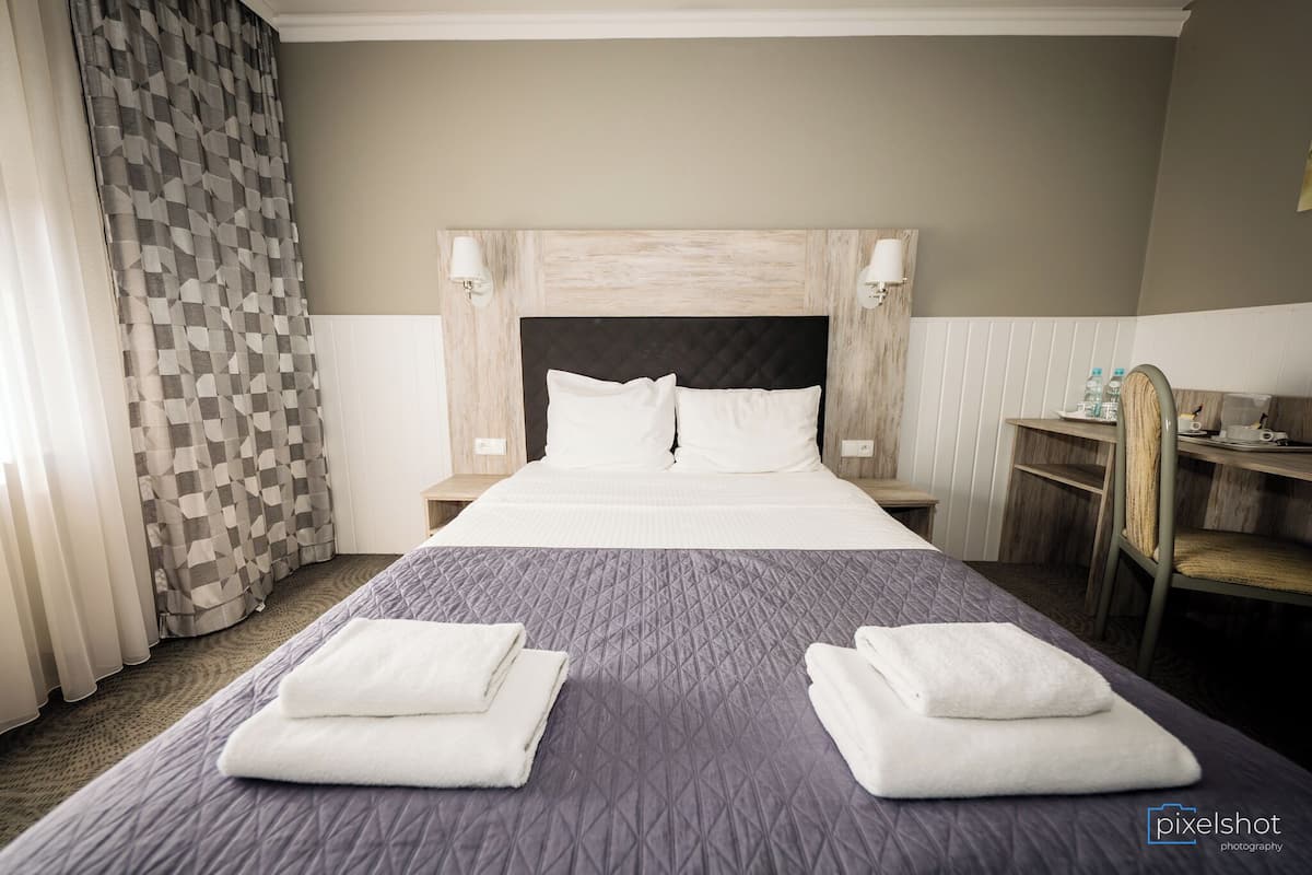 comfort room | desk, blackout curtains, iron/ironing board, free wifi