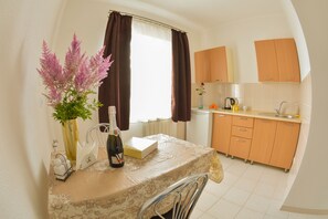 Premium Double or Twin Room, Shared Bathroom | Private kitchen | Full-size fridge, microwave, oven, stovetop