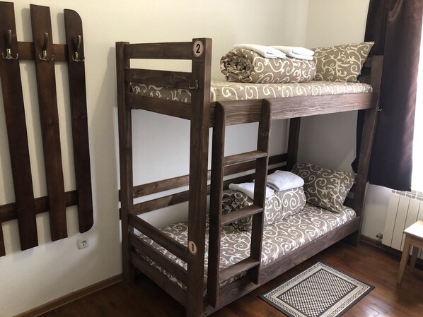 One Bed in 4-Bunk Bed Mixed Dormitory | Living area | TV - Grand Hostel (Chernivtsi)