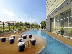 2 outdoor pools, open 6:00 AM to 9:00 PM, pool umbrellas, sun loungers - Mercure Makassar Nexa Pettarani (Makassar)