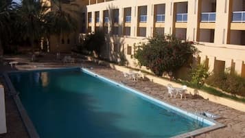 Outdoor pool, pool umbrellas, pool loungers