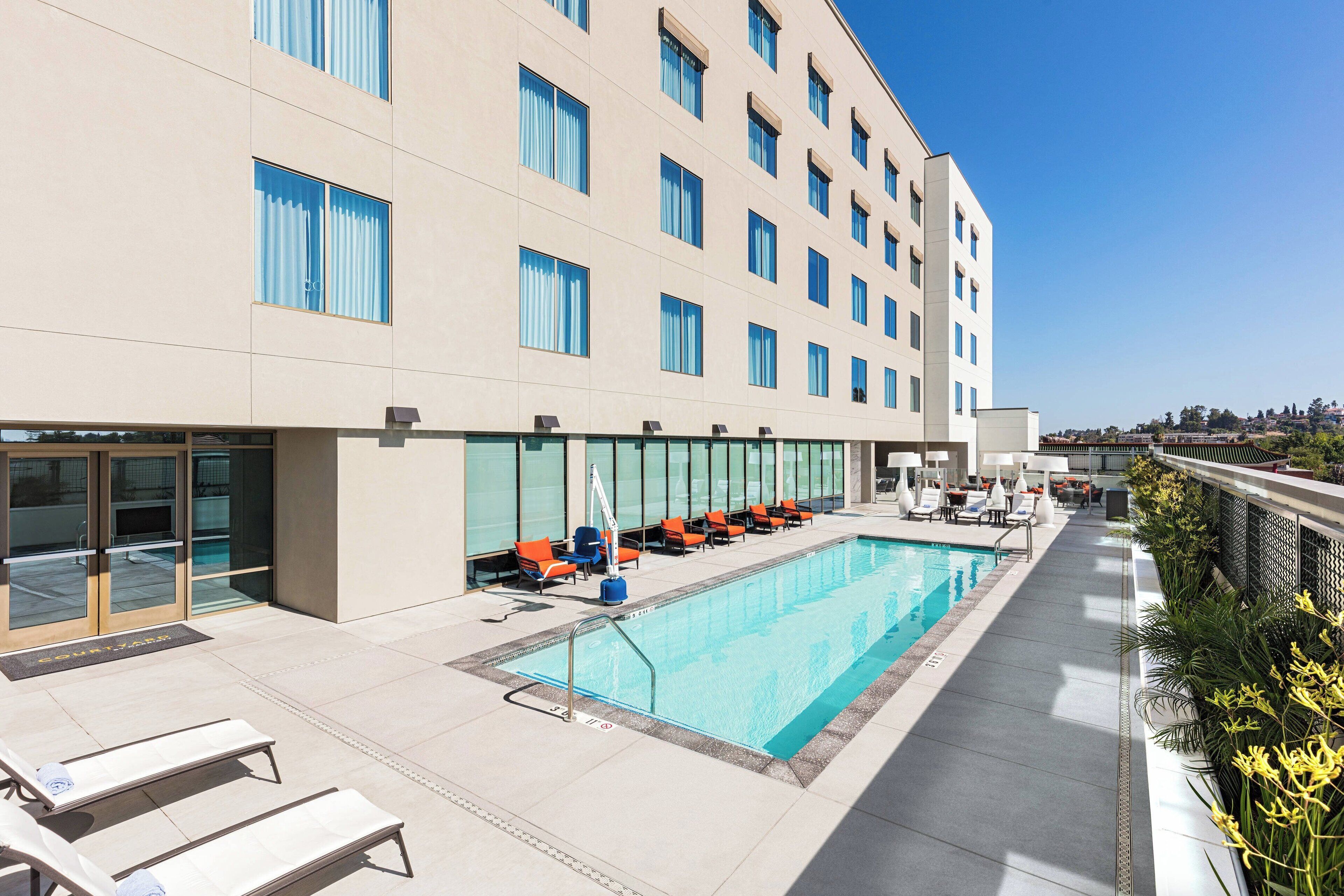 outdoor pool, open 8:00 am to 10:00 pm, pool loungers