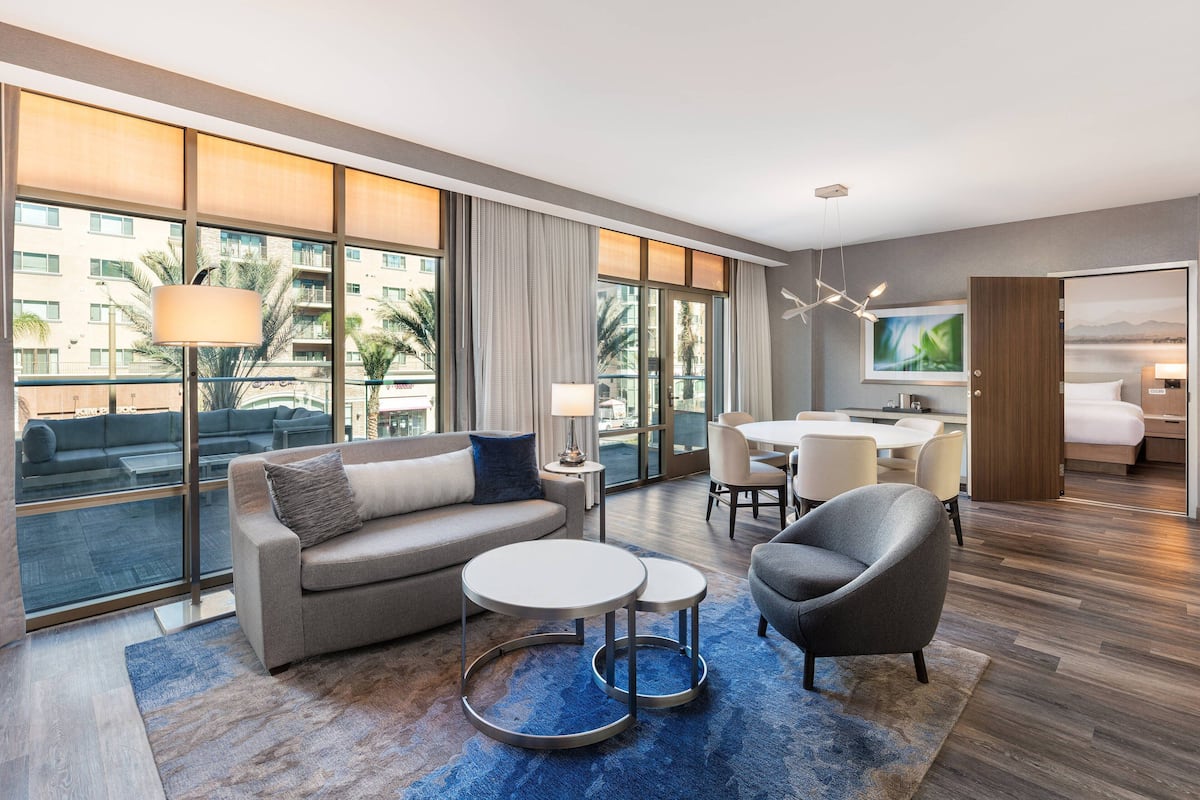 Suite, 2 Bedrooms | Living area | 55-inch flat-screen TV with digital channels, streaming services