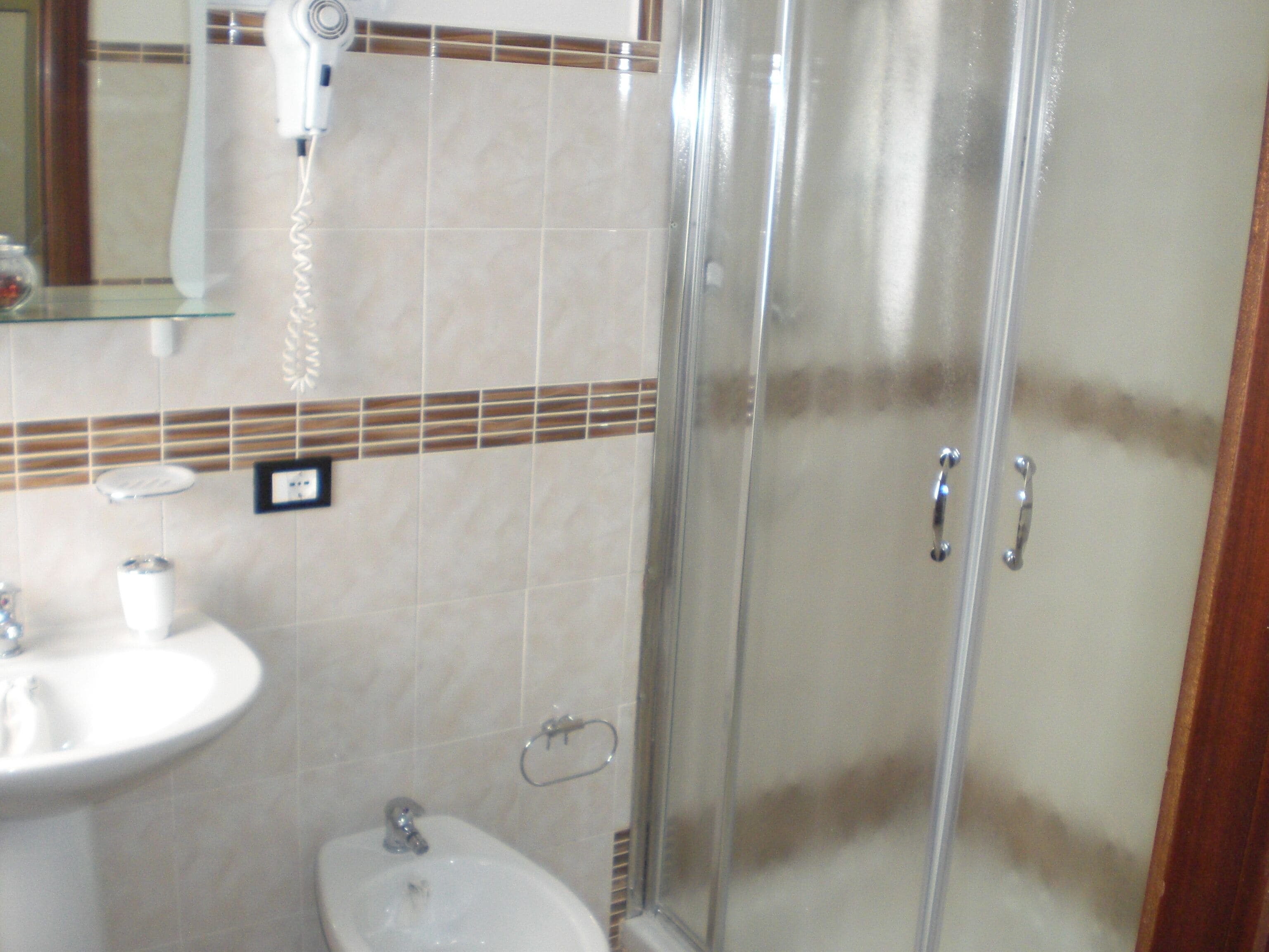 Double Room | Bathroom | Shower, hair dryer, bidet, towels