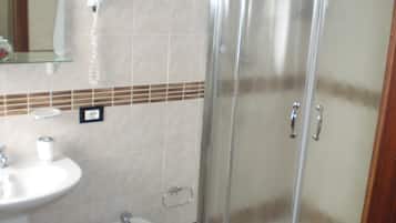 Double Room | Bathroom | Shower, hair dryer, bidet, towels