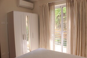 Standard Room, 1 Bedroom, Balcony | 1 bedroom, individually decorated, individually furnished