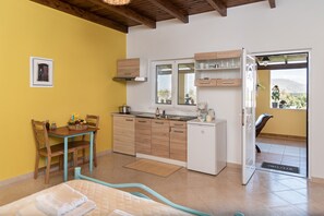 Standard Studio, Partial Sea View (Yellow) | Private kitchen | Coffee/tea maker, electric kettle, cookware/dishes/utensils